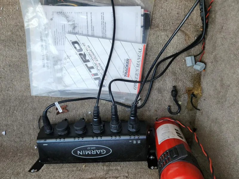 Slide: The Image of Garmin GPS 16 setup with Nitro 896 DC manual and fire extinguisher, 2001 model. - 9