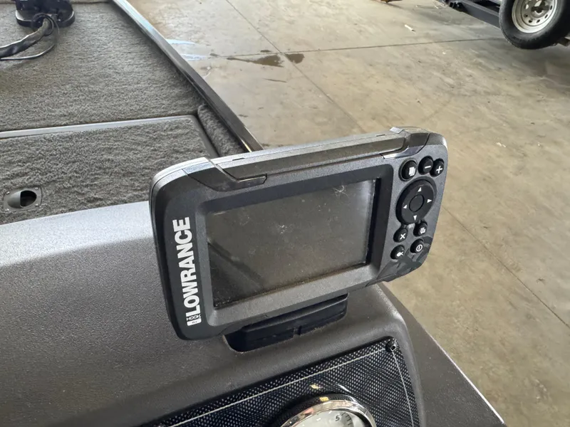 Slide: The Image of Lowrance fish finder on 2021 Tracker Bass Tracker Classic XL boat dashboard. - 14