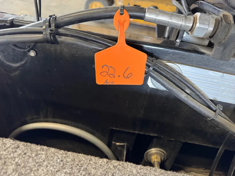 Slide: The Image of 2021 Tracker Bass Tracker Classic XL engine compartment with orange tag labeled "22.6". - 17