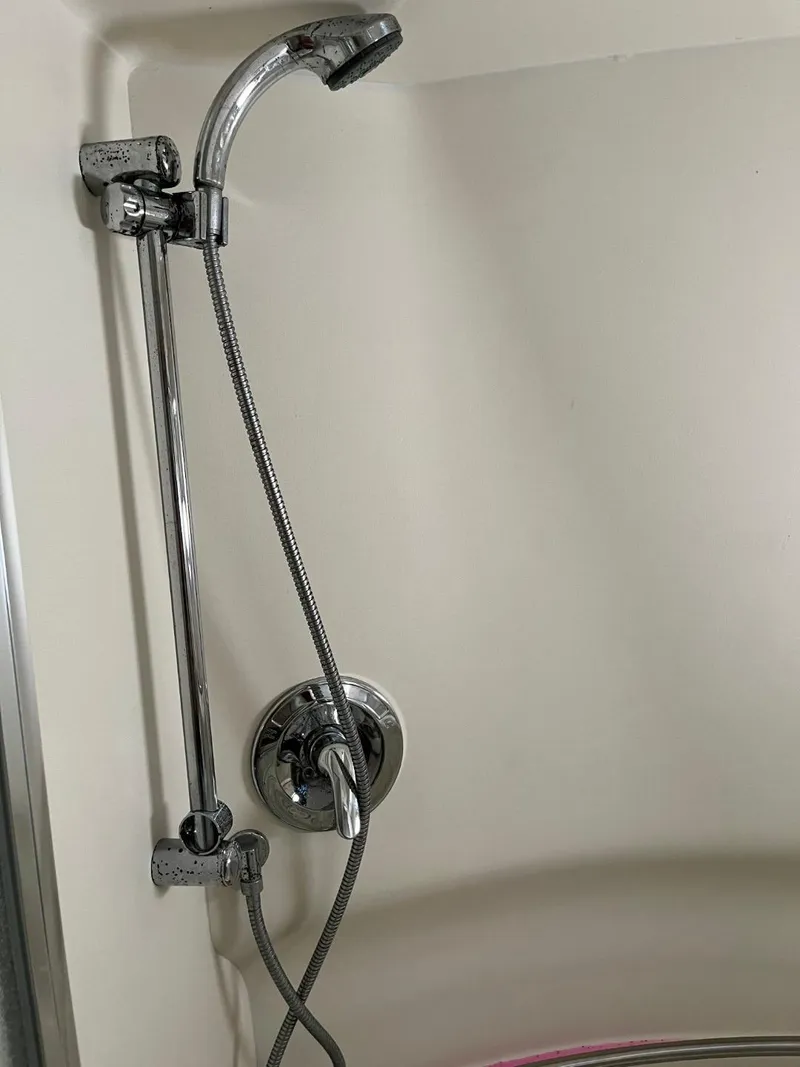 Slide: The Image of Shower fixture in a 1996 Maxum 4100 SCR boat bathroom. - 16