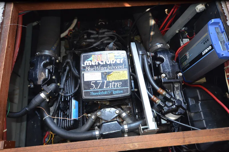 Slide: The Image of Engine compartment of a 1988 Carver 3207 with a 5.7 Litre MerCruiser BlueWater inboard engine. - 21