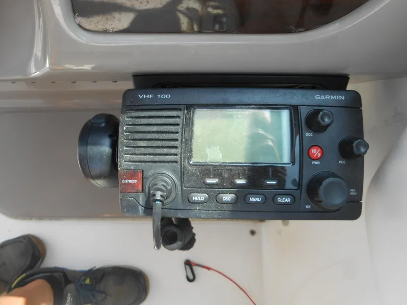 Slide: The Image of VHF radio on 2014 Chaparral 270 Signature boat dashboard. - 13