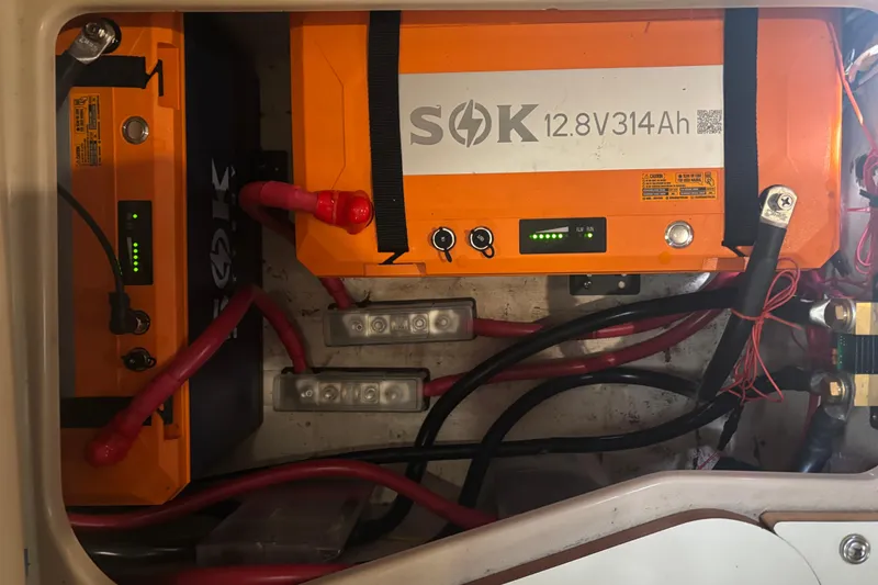 Slide: The Image of Battery compartment of a 2001 Island Packet 420 with SOK 12.8V 314Ah batteries. - 39