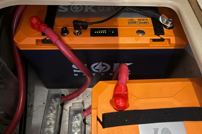 Slide: The Image of Battery compartment of a 2001 Island Packet 420 sailboat with SOK lithium battery. - 40