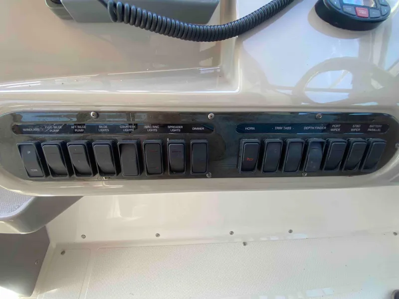 Slide: The Image of Raymarine navigation system on 2004 Cruisers Yachts 340 Express dashboard. - 18