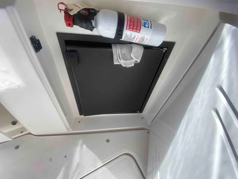 Slide: The Image of 2004 Cruisers Yachts 340 Express interior with sink and countertop. - 21