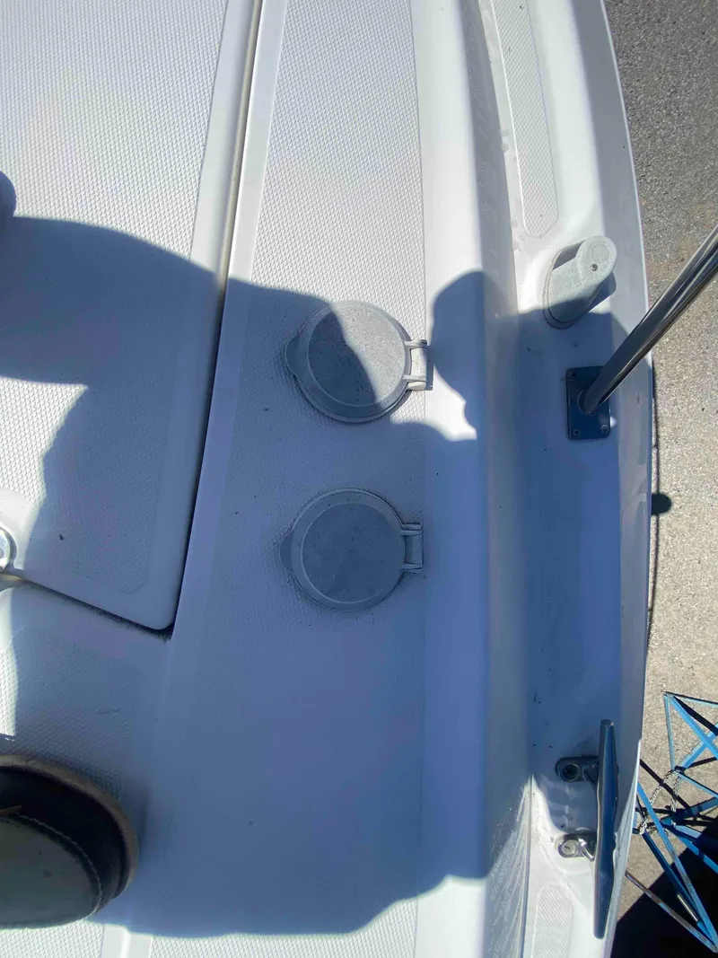 Slide: The Image of 2004 Cruisers Yachts 340 Express anchor chain and deck detail. - 25