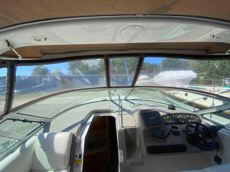 Slide: The Image of 2004 Cruisers Yachts 340 Express deck details with fittings and shadows. - 26