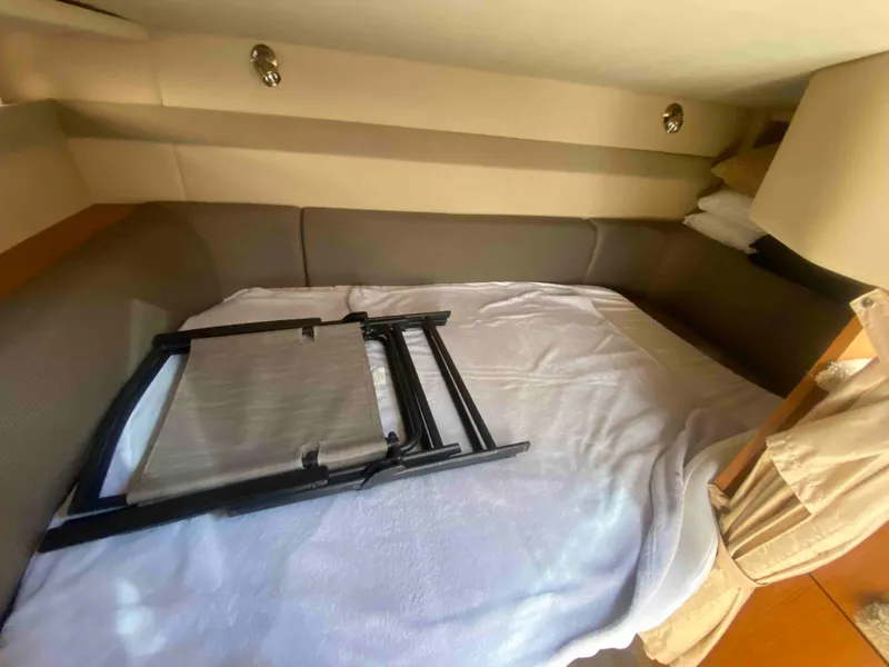 Slide: The Image of 2004 Cruisers Yachts 340 Express bathroom with shower, sink, and modern fixtures. - 39