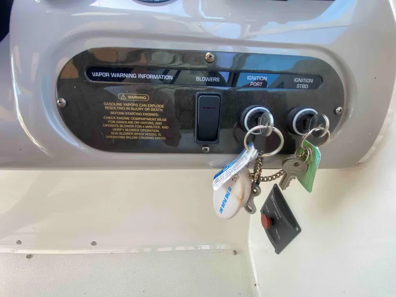 Slide: The Image of Control panel of a 2004 Cruisers Yachts 340 Express boat. - 19