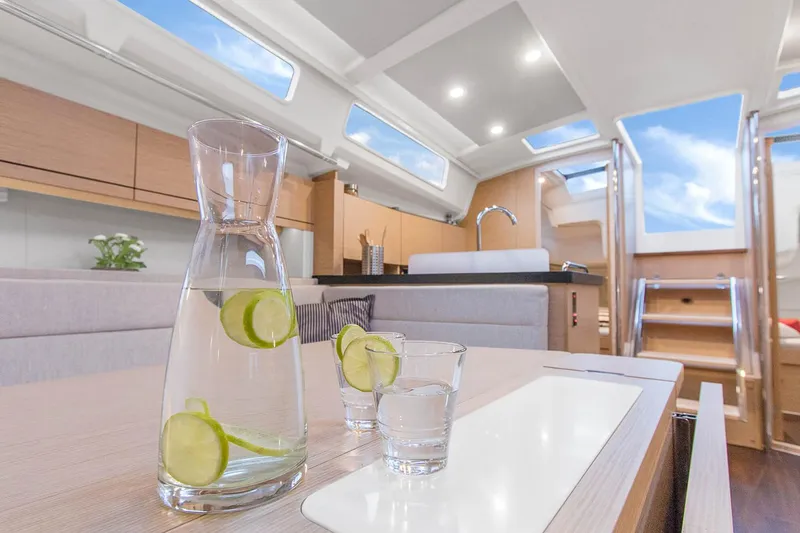 Slide: The Image of Luxurious interior of 2025 Hanse 418 yacht with modern kitchen and skylights. - 10