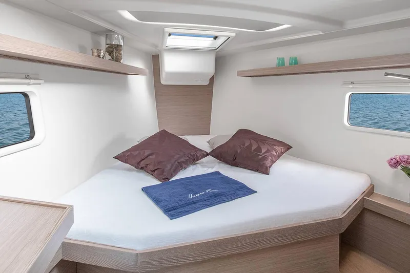 Slide: The Image of Luxurious cabin interior of 2025 Hanse 418 yacht with cozy bedding. - 15