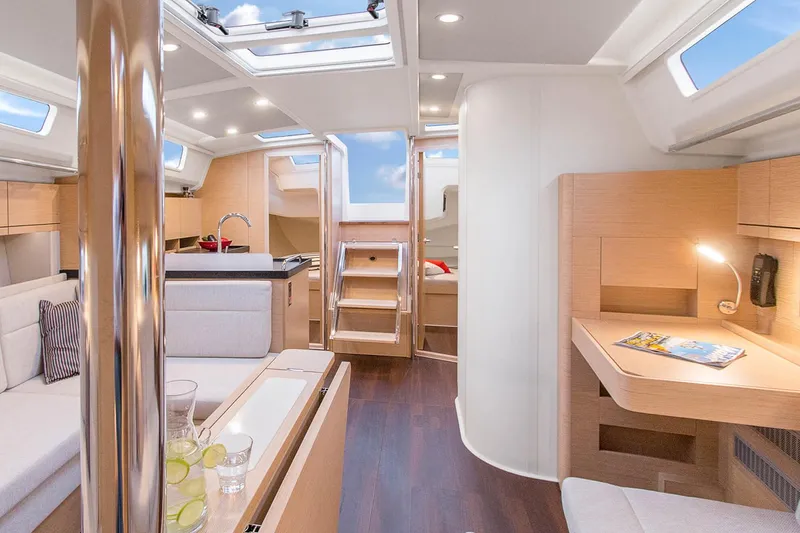 Slide: The Image of Modern interior of 2025 Hanse 418 yacht with sleek design and natural lighting. - 5