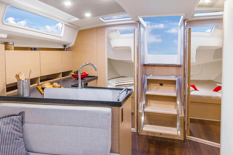 Slide: The Image of Modern interior of 2025 Hanse 418 yacht with sleek kitchen and cozy seating area. - 6
