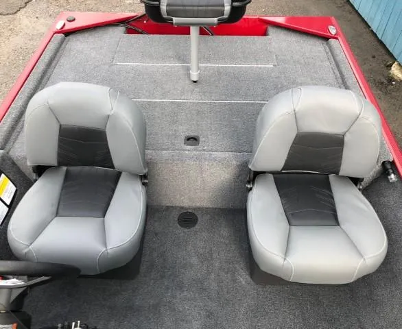 Slide: The Image of 2024 Tracker Bass Tracker Classic XL boat interior with two gray seats. - 10