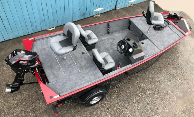 Slide: The Image of 2024 Tracker Bass Tracker Classic XL fishing boat with gray seating and red trim. - 3