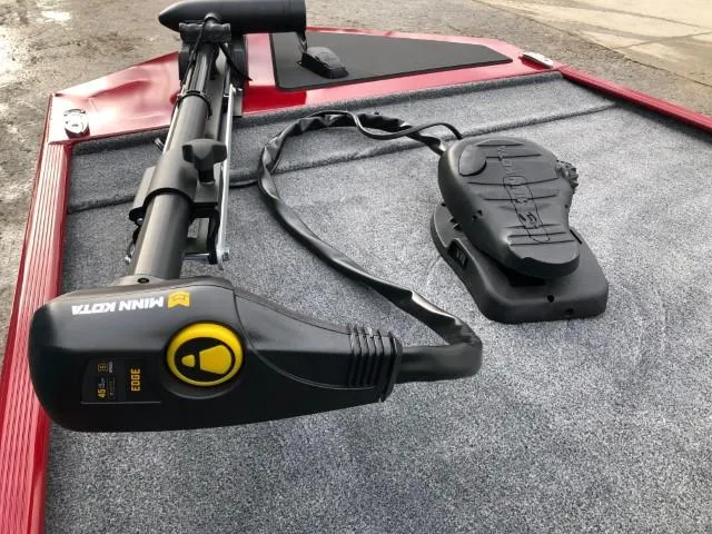 Slide: The Image of 2024 Tracker Bass Tracker Classic XL with Minn Kota trolling motor on deck. - 5