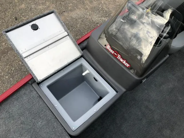 Slide: The Image of 2024 Tracker Bass Tracker Classic XL boat storage compartment open. - 6