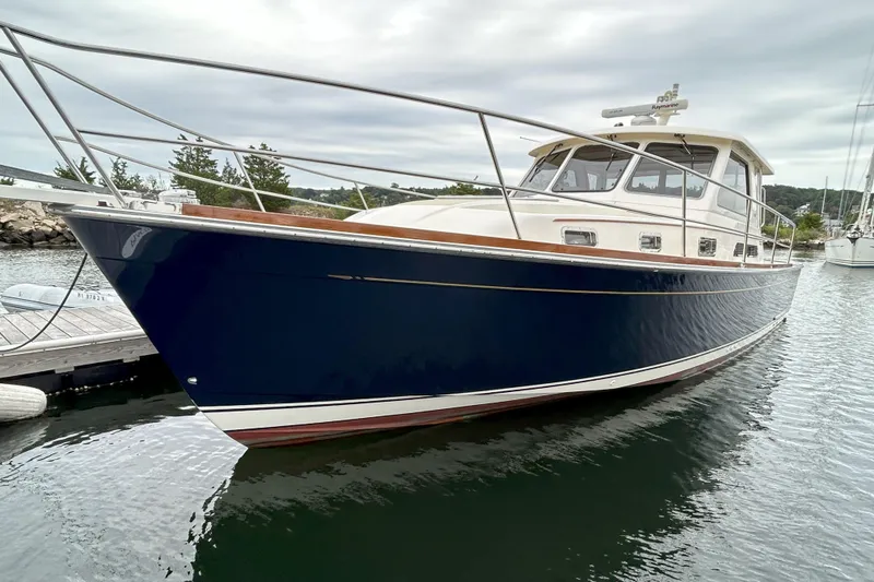 Slide: The Image of Helm of 2006 Sabre 38 Express HDTP MY with navigation equipment and steering wheel. - 1