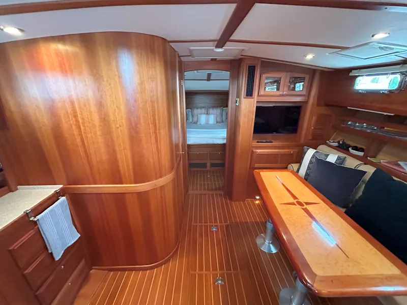 Slide: The Image of Helm of 2006 Sabre 38 Express HDTP MY with navigation equipment, overlooking marina. - 10