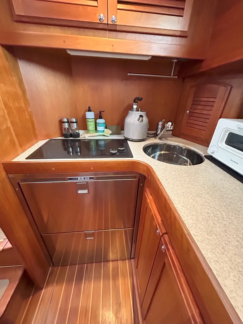 Slide: The Image of Interior of 2006 Sabre 38 Express HDTP MY yacht with seating and helm. - 15