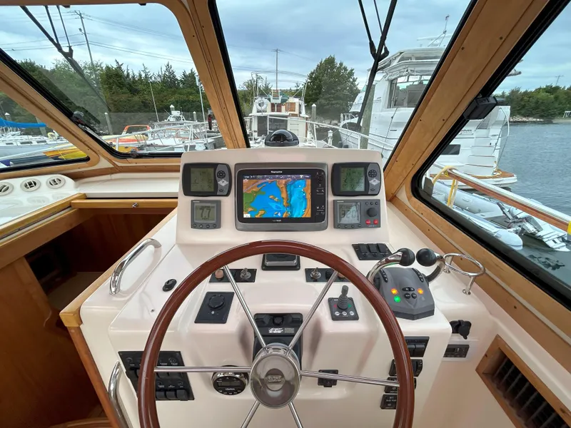 Slide: The Image of Luxurious bathroom in 2006 Sabre 38 Express HDTP MY yacht, featuring shower and modern amenities. - 30