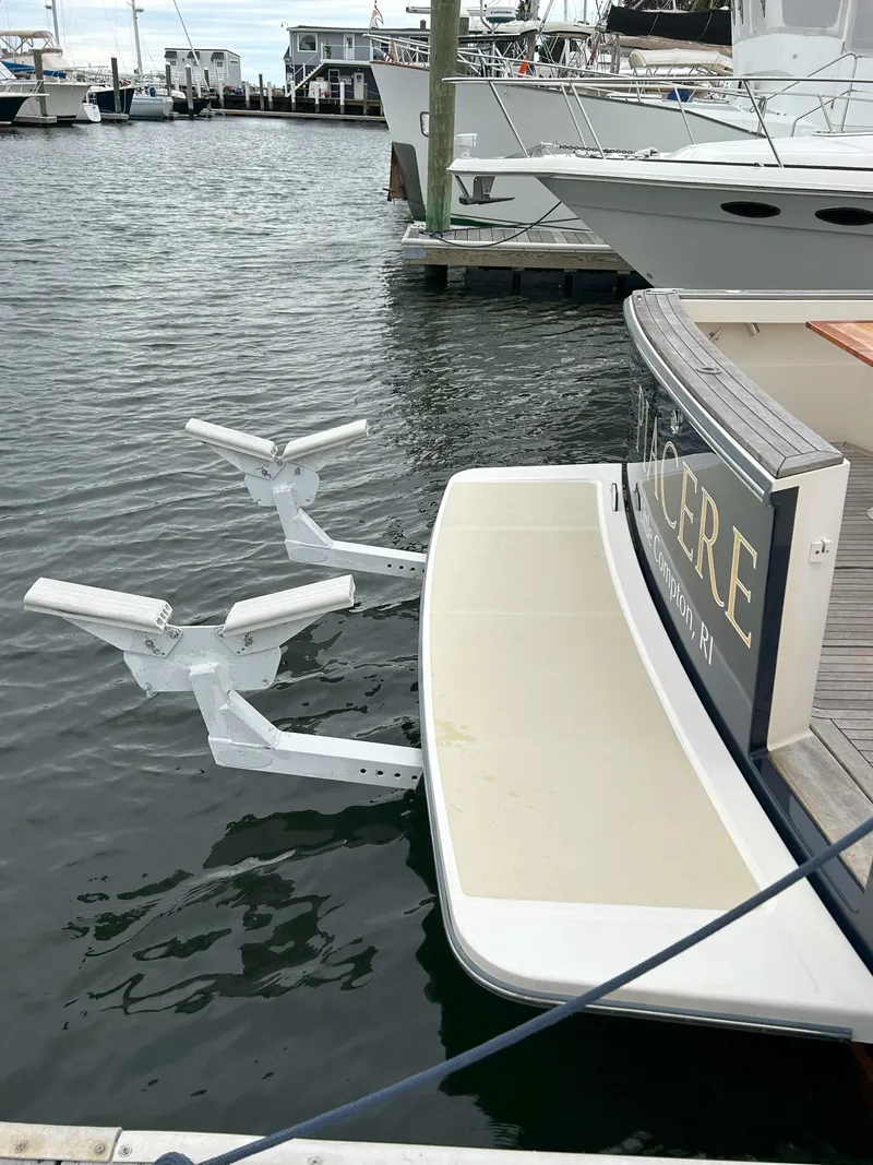 Slide: The Image of 2006 Sabre 38 Express HDTP MY boat docked in a marina. - 39