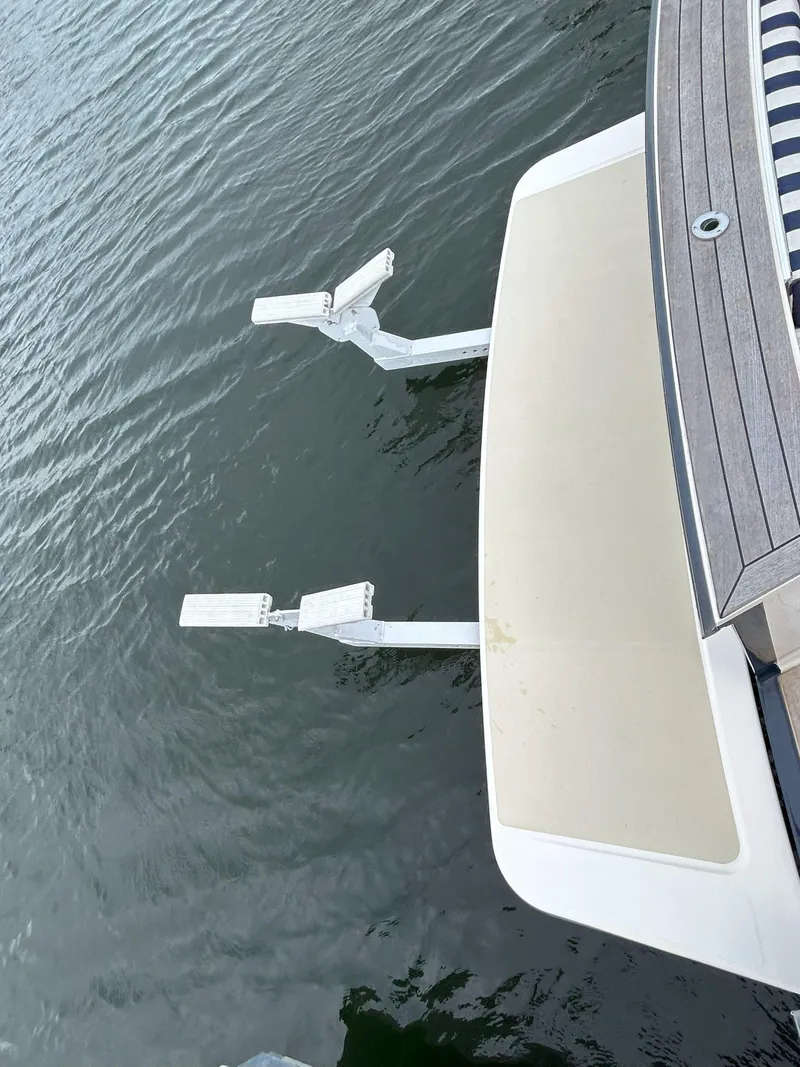 Slide: The Image of 2006 Sabre 38 Express HDTP MY docked at marina, front view. - 7