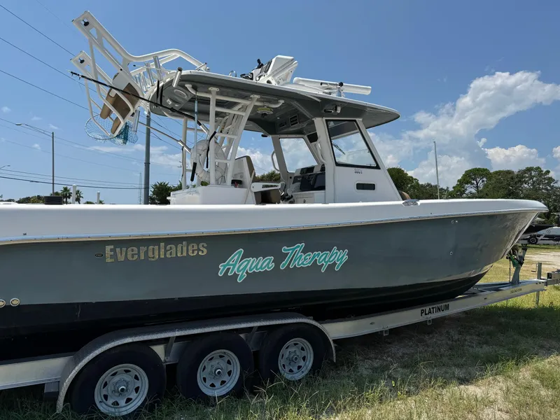 Slide: The Image of 2013 Everglades 355 Tournament boat named "Aqua Therapy" on a trailer. - 1