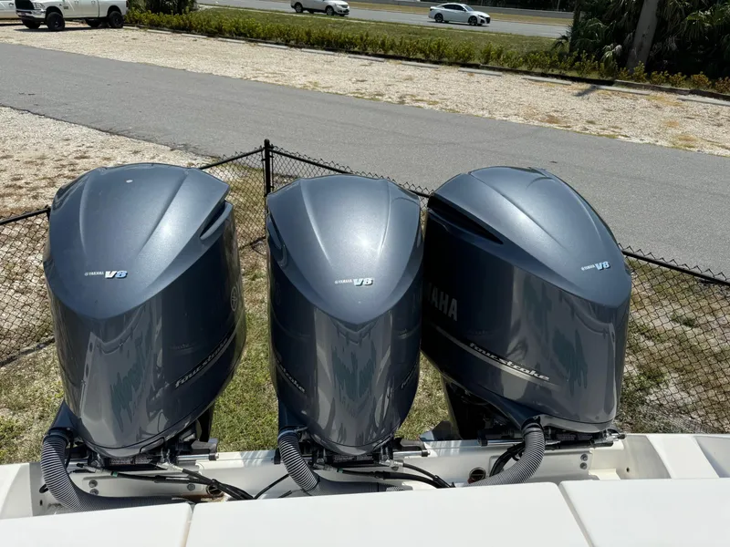 Slide: The Image of Triple Yamaha outboard engines on a 2013 Everglades 355 Tournament boat. - 10