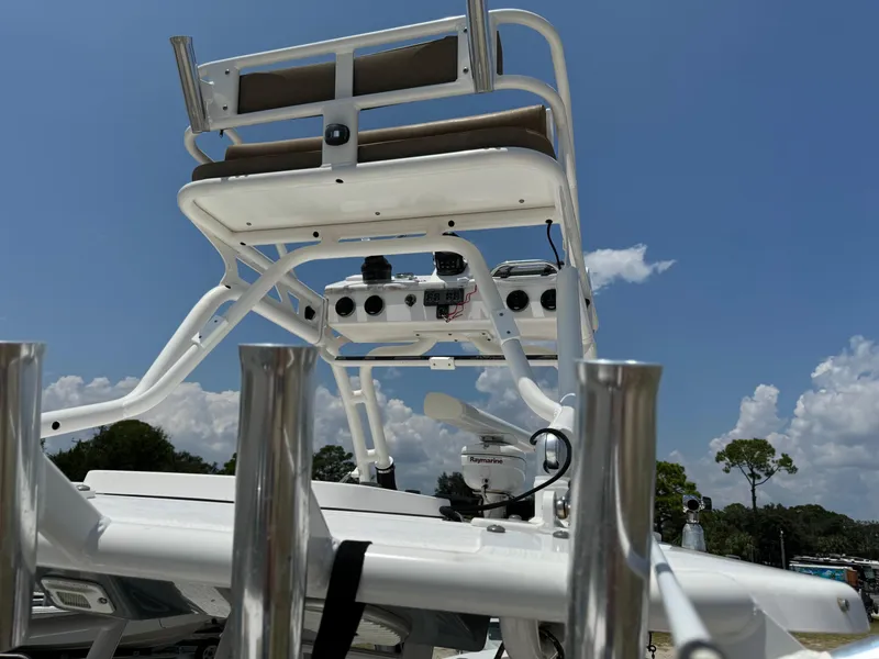 Slide: The Image of 2013 Everglades 355 Tournament boat tower under a clear blue sky. - 11