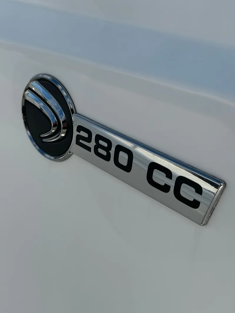 Slide: The Image of Edgewater 280CC 2019 model emblem on white surface. - 26