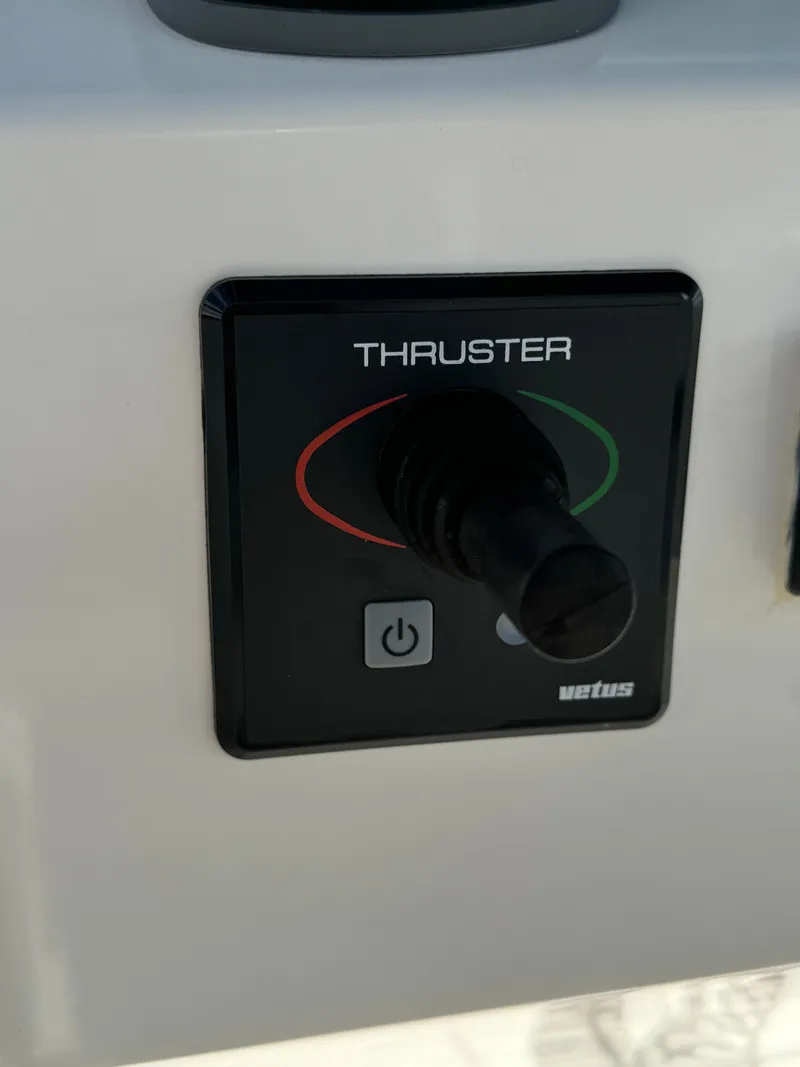 Slide: The Image of Edgewater 280CC 2019 boat thruster control panel with joystick. - 27