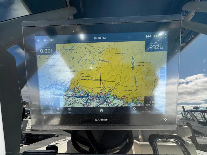 Slide: The Image of Garmin navigation display on 2019 Edgewater 280CC boat, showing detailed marine map. - 32