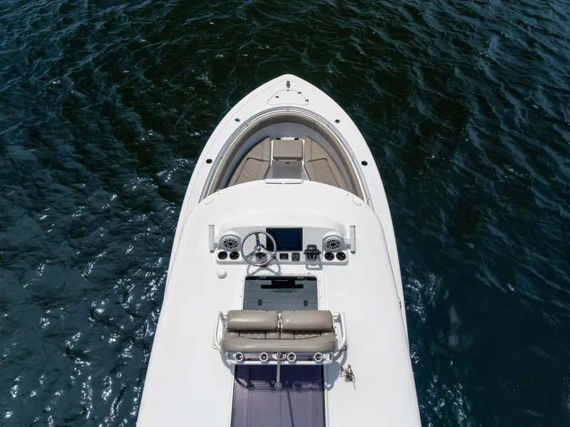Slide: The Image of 2021 Sportsman Open 302 Center Console boat on water, aerial view. - 13