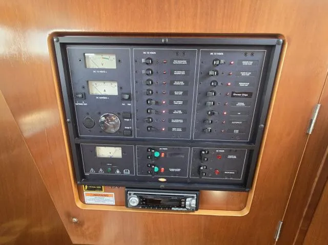 Slide: The Image of Electrical control panel on 2003 Beneteau 42CC Oceanis Clipper yacht. - 10