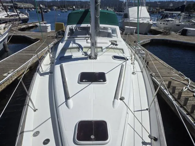 Slide: The Image of 2003 Beneteau 42CC Oceanis Clipper sailboat docked at marina. - 30