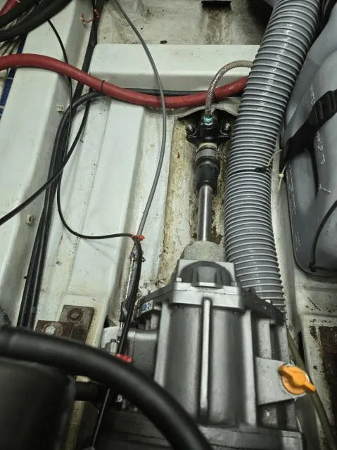 Slide: The Image of Engine compartment of 2003 Beneteau 42CC Oceanis Clipper sailboat, showing mechanical components and wiring. - 34