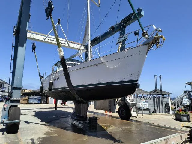 Slide: The Image of 2003 Beneteau 42CC Oceanis Clipper sailboat in dry dock for maintenance. - 36