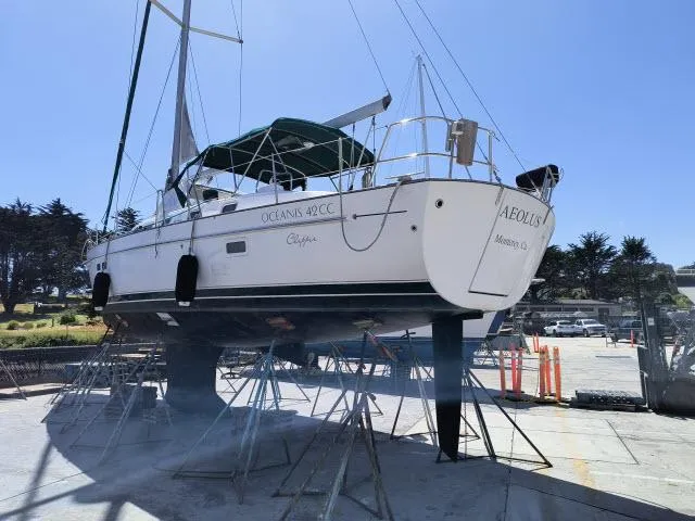 Slide: The Image of 2003 Beneteau 42CC Oceanis Clipper sailboat on dry dock for maintenance. - 37