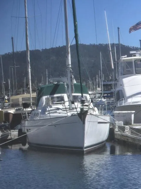 Slide: The Image of 2003 Beneteau 42CC Oceanis Clipper sailboat docked in marina. - 39