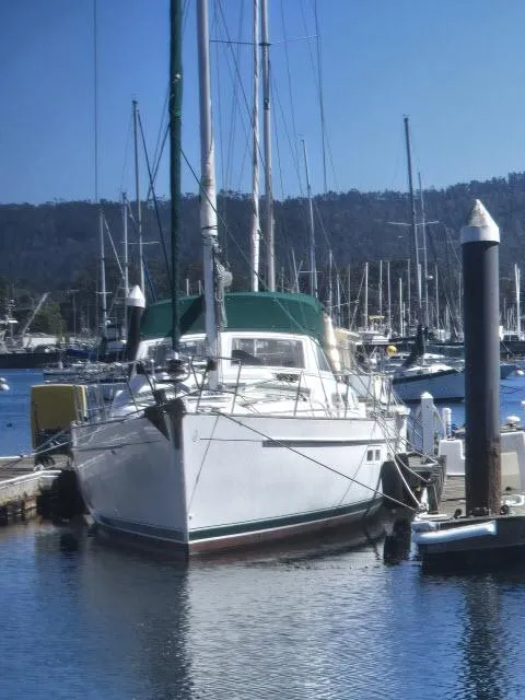 Slide: The Image of 2003 Beneteau 42CC Oceanis Clipper sailboat docked in a marina. - 40
