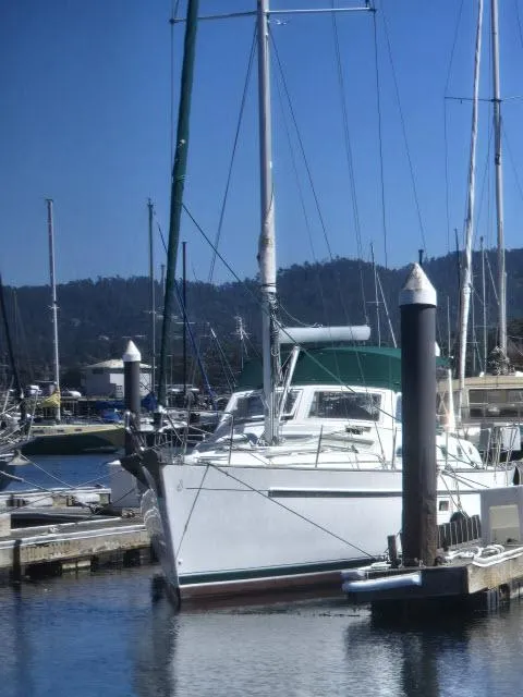 Slide: The Image of Beneteau 42CC Oceanis Clipper 2003 sailboat docked in a marina. - 41