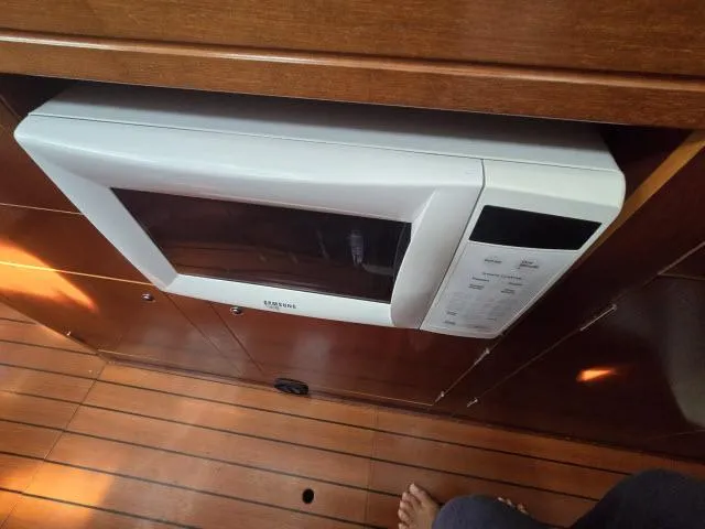 Slide: The Image of Microwave in 2003 Beneteau 42CC Oceanis Clipper yacht kitchen. - 7
