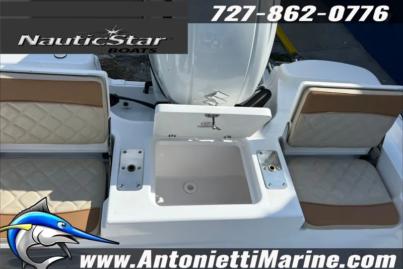 Slide: The Image of 2025 NauticStar 194 Bay boat interior with seating and storage, Antonietti Marine contact details. - 14
