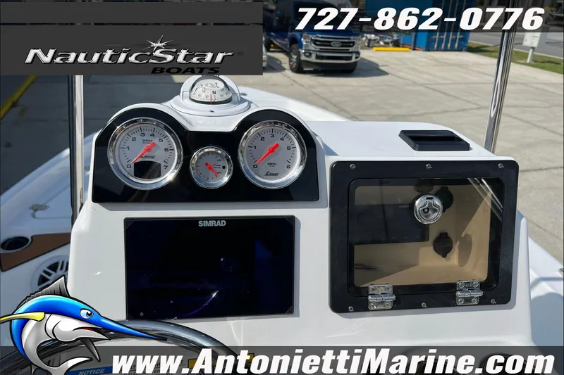 Slide: The Image of NauticStar 194 Bay 2025 boat dashboard with gauges and Simrad display. - 22