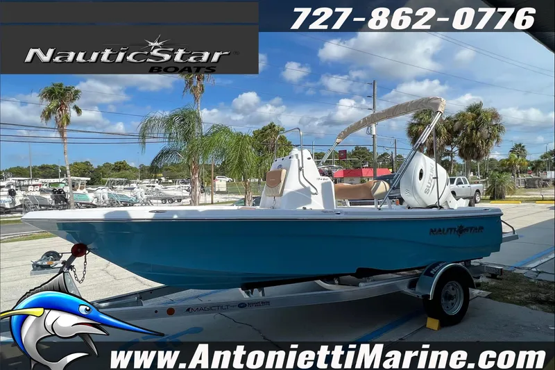 Slide: The Image of 2025 NauticStar 194 Bay boat on trailer at Antonietti Marine dealership. - 24