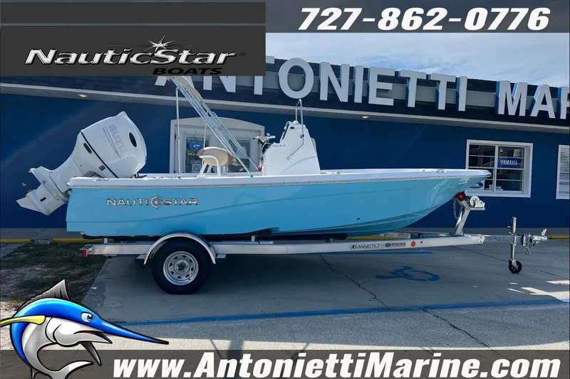 Slide: The Image of 2025 NauticStar 194 Bay boat on trailer at Antonietti Marine dealership. - 25