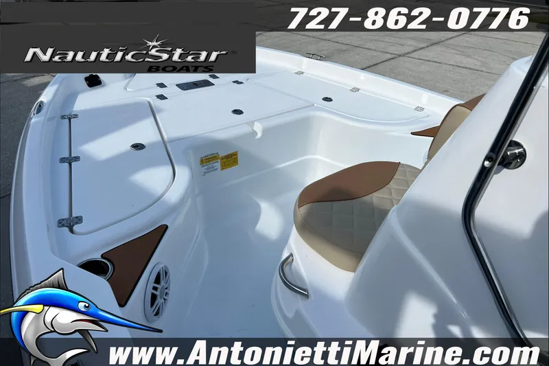 Slide: The Image of 2025 NauticStar 194 Bay boat interior with seating, showcased by Antonietti Marine. - 6