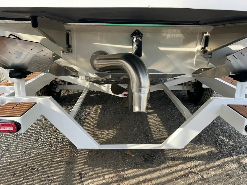 Slide: The Image of 2022 Tigé Z3 boat trailer with stainless steel exhaust and wooden accents. - 5